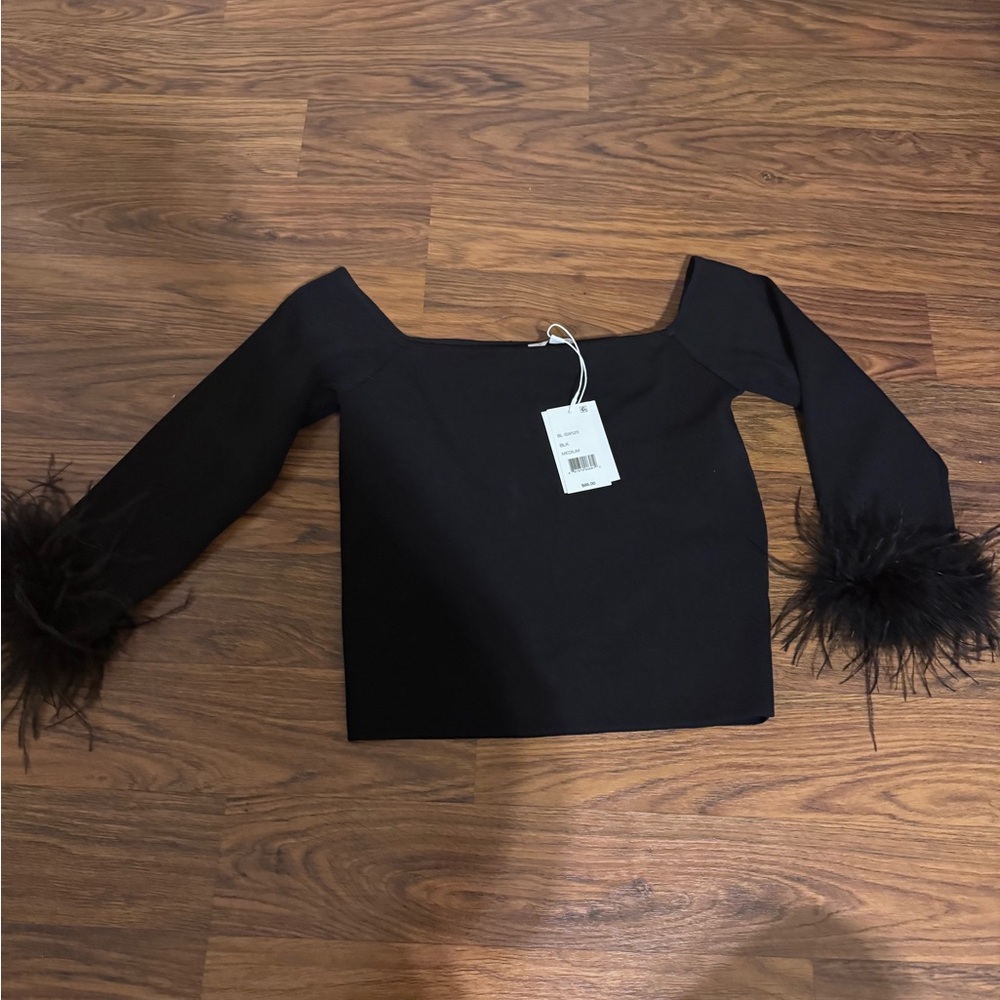 Black bandage- feather sleeves 🖤